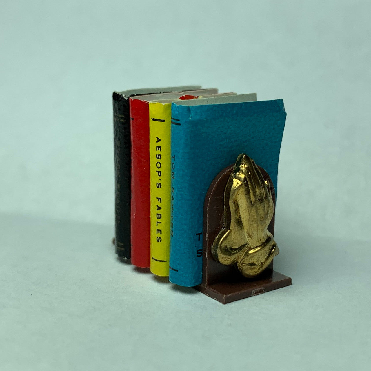 Boekensteunen met boekjes