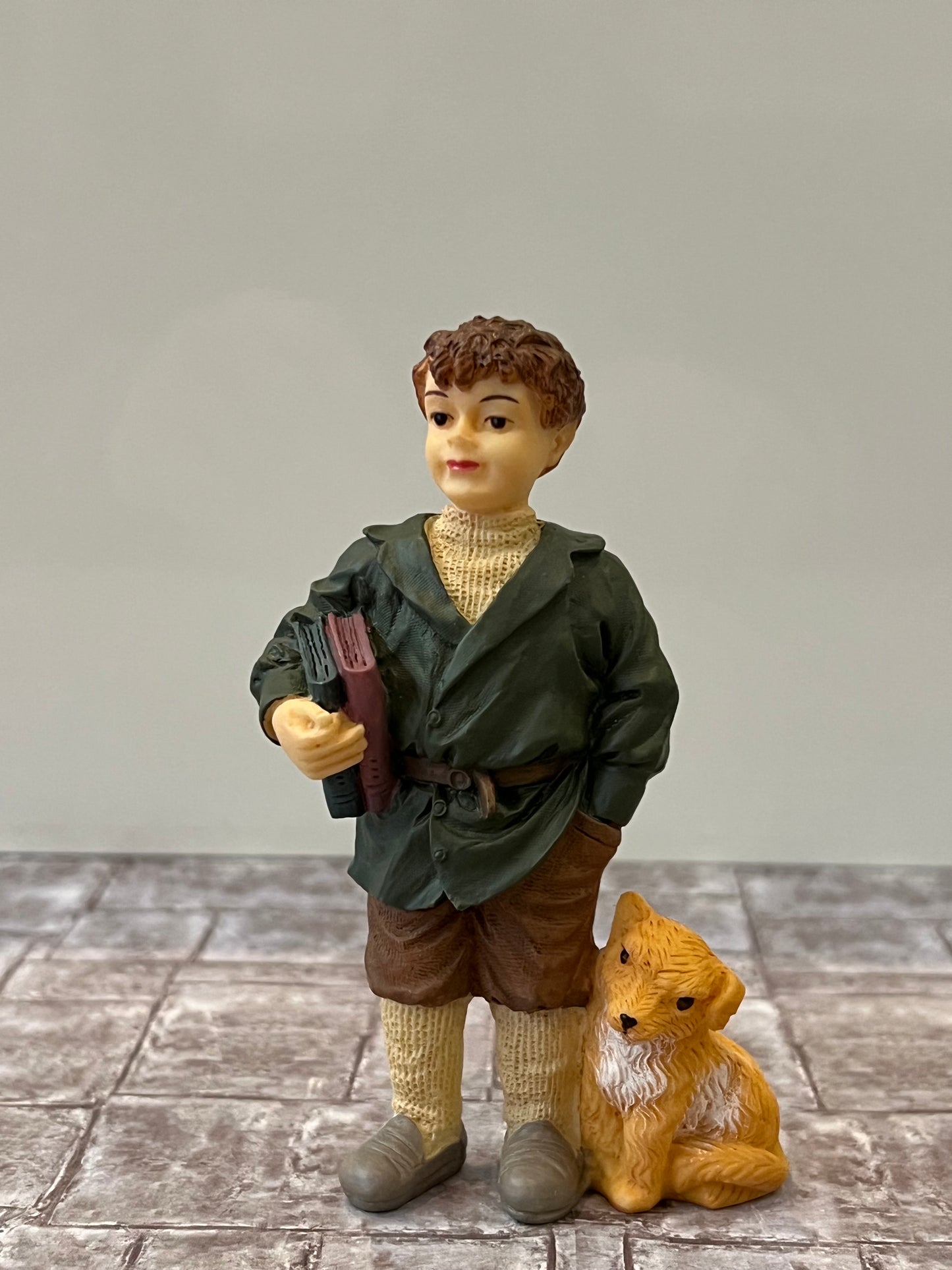 Poly resin popje Jongen met hond