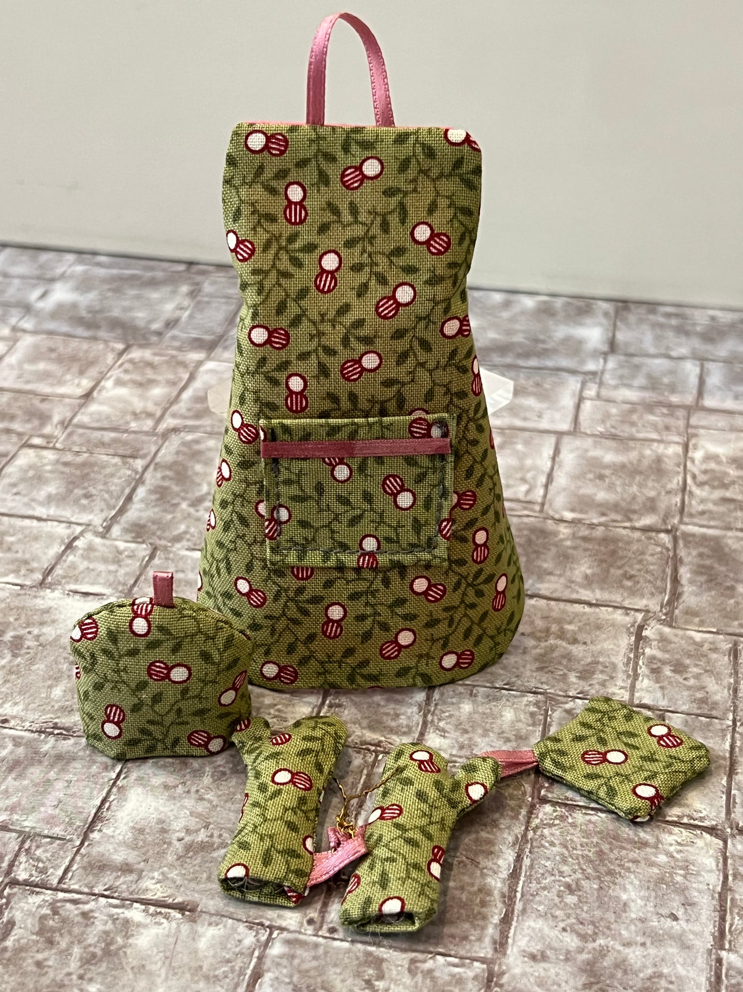 Keukenschort, theemuts, pannenlap en ovenhandschoenen